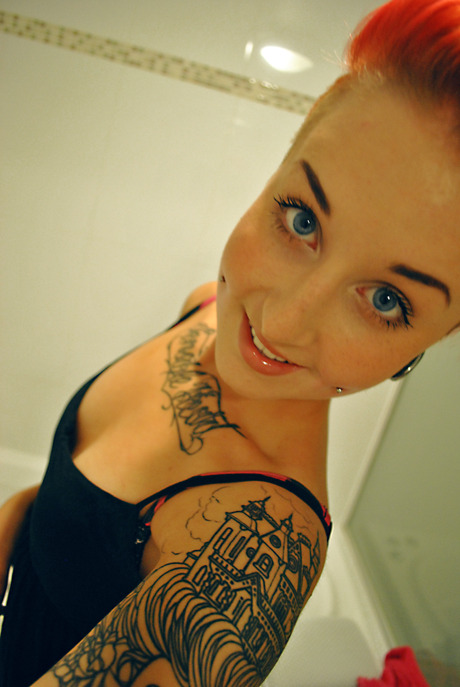 luk3y:  love her tattoo  i love her beautiful blue eyes.&lt;3