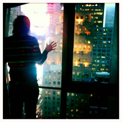 Manny and the view from our hotel room on NYC - Marriott Marquis, times square, 24 floor