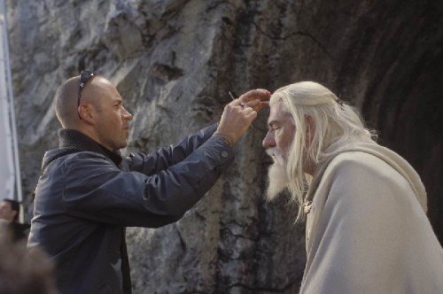 Ian Mckellen having his wig fixed