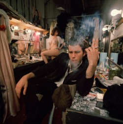 sophiecanfly:   Tom Waits in a burlesque show dressing room, 1970 by Joel Brodsky   Tom Waits is one of those people, who I will always listen to….no matter what mood I’m in, he is amazing, he has a perfect voice, I only wish he would sing me to