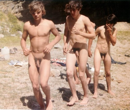Naked boy at beach