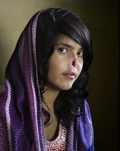 soggysoil:  Photograph by Jodi Bieber Bieber’s portrait of an Afghan woman whose nose and ears were cut off in retaliation for fleeing her abusive husband. 