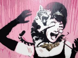 nedhepburn:  Banksy’s British stencil artist EElus’s Audrey Hepburn graffiti. 