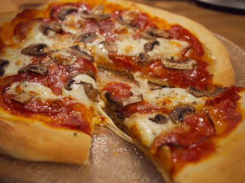 Home-made pizza (by PenLlawen)
Topped with chorizo, fresh mozzerella, caramelised onions, and mushrooms.
I’m still not quite there with my pizza base; some tweaking of flour type and rising time is necessary, and I think I need to buy a pizza stone....