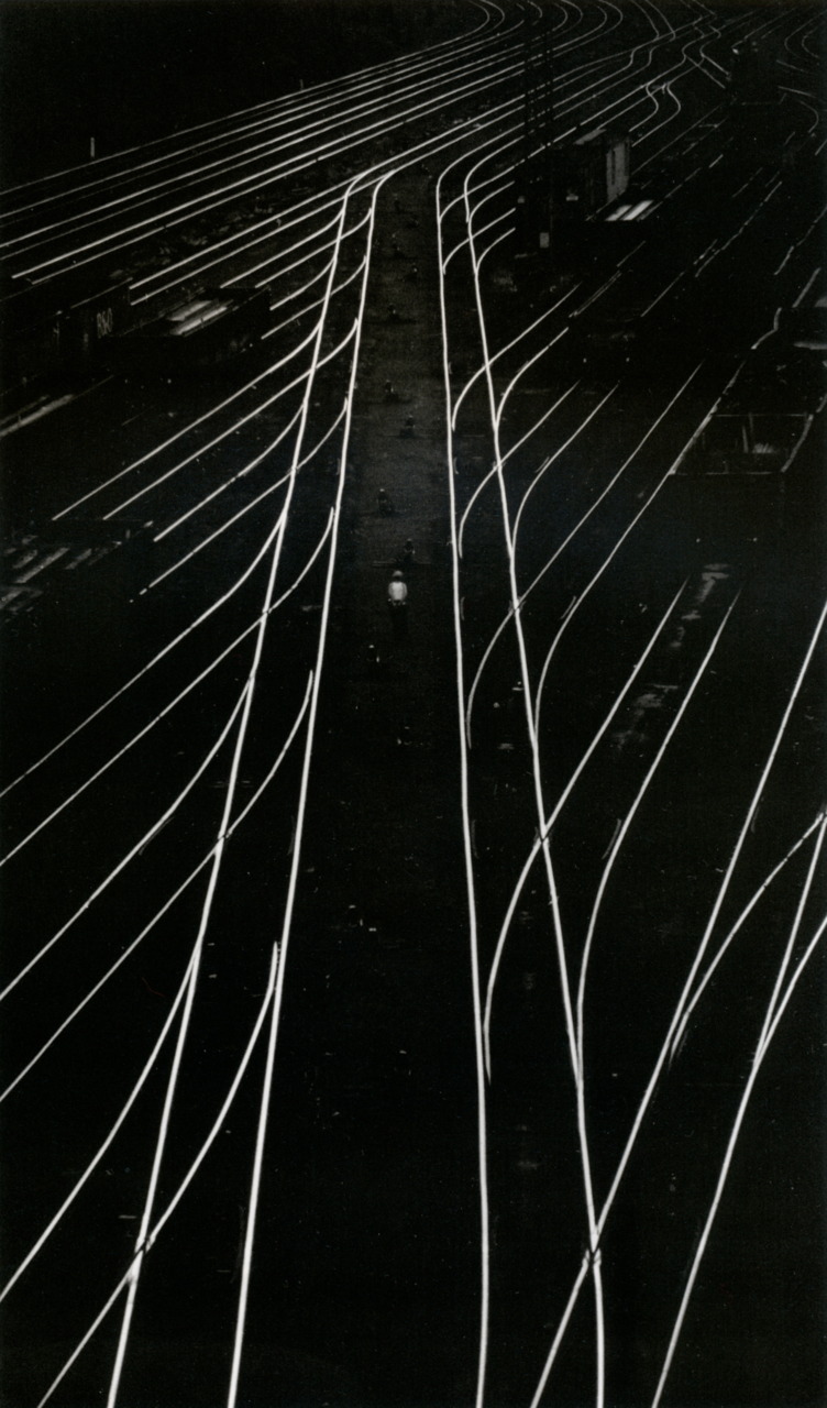 liquidnight:  W. Eugene Smith Man Lost in a Maze of Railroad Tracks, 1955 From W.