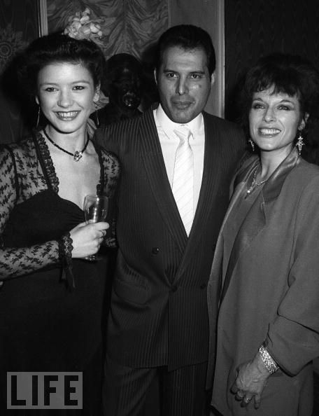 Catherine Zeta Jones, Freddie Mercury and Jill Gasgoine at party or musical ‘42nd Street’ on August 8, 1984 in London, England.
