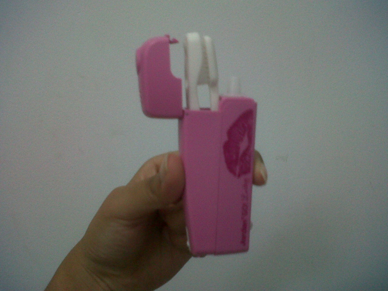 My new all-in-one travel-sized dental care pack. It’s awesome and it’s pink! (girlish squeal)