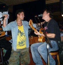 brunomarsfans:  This was actually recently, taken in January at Chart House in Marina Del Ray, CA while jammin’ with his uncle John Valentine. 