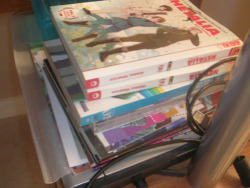 This is below the desk, my Hetalia manga and DVDs are here, as well as doujins, and a stack of cards, I&rsquo;ll show those in the next photo. Oh yeah, my scanner is under that too XD