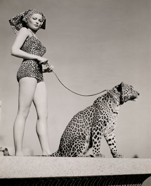 Gene Tierney and leashed leopard, photo by Frank Powolny