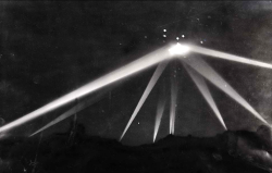 kateoplis:   Battle of L.A., Feb. 25, 1942: Searchlights converge on an unknown object in the skies over Los Angeles. During the early morning air-raid alert, more than 1,400 anti-aircraft shells are fired. 