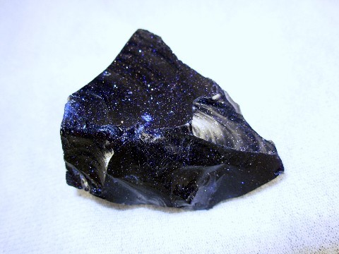 darling-highness:  space-cadet-john:  dethcabforbooty:  this rock looks like a piece of the fucking galaxy  I’m p sure that obsidian but does anyone kno what kind? bc i need some galaxy rock in my house rn  it’s not obsidian. it’s goldstone, which