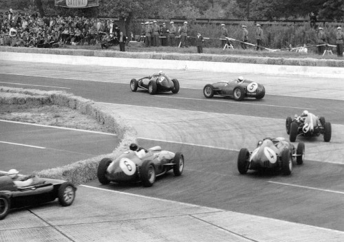 Jo Bonnier in the BRM leads the Ferrari of Phil Hill , the Cooper of Bruce Mclaren , eventual winner Tony Brooks’s Ferrari and the Ferrari of Dan Gurney