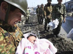 rachpuckermanleamsalling:   This 4 month old baby was found under rubble in Ishinomaki, state of Miyagi, Japan. She was stuck under the rubble for 3 days. She managed to survive for those 3 days and she has since been reunited with her father.  