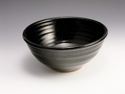 jaywiese:  This one’s mine ☺ Black GP [general purpose] bowl by Jay Wiese. Stoneware with black slip glaze 5 ¼” dia. × 2 5/8” tall 2009