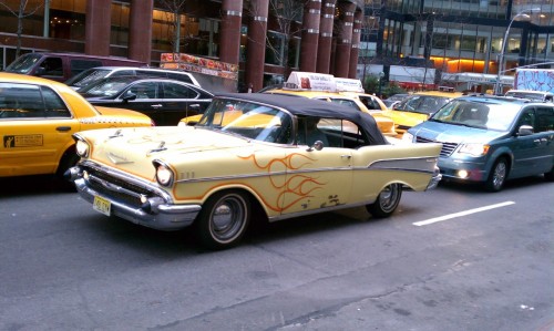 Only in nyc do you see an old school car with flames from the 50’s cought this on the way to the gym