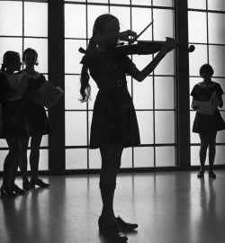 Violinist rehearsing at the Methodist Ladies’