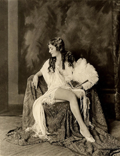 garconniere:  uncredited image of a silent film star (or ziegfield girl?) with sausage
