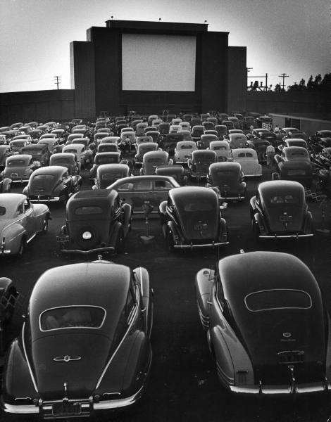 rubyredglitterpumps:  Cars filling lot at Rancho Drive-In Theater, 1948. Photographed by Allan Grant 