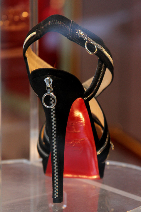 Christian Louboutin zipper sandals. 