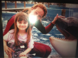 parkavenue:  This is me at age six with Taima, one of the Orca Whales at Sea World Orlando. I grew up around these animals. One night, after the park had closed, while my father finished up his work, I played catch with a fish and a 14,000 pound whale