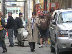 yvrshoots:  Misha Collins tweets during a break from filming Supernatural’s Season Finale in downtown Vancouver alley. Photo by Marguerite Blackney 
