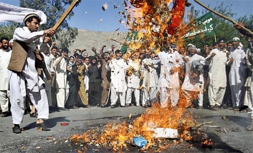 ryking:  Taliban exploits Afghan riots over Koran burning Above: “Afghan protesters burn an effigy o