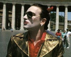 Bono  - July 1993  Rome - Vatican,  St Peter’s Square (Italy) During our Italian dates, in a performance-art moment, I had myself filmed walking across the square at the Vatican. MacPhisto had developed a limp at this point so I had a walking