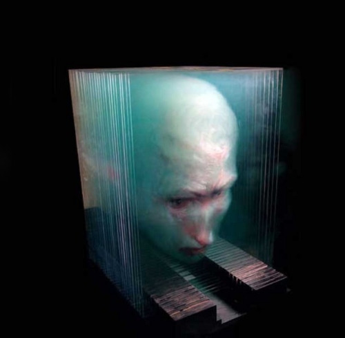 Ghostly Holographic Artwork  Using special colored pencils, Beijing-based Xia Xiaowan paints on 14 to 30 panes of glass to create ghostly holographic artwork. Walk around one of these paintings and you will notice that the image changes along each shift