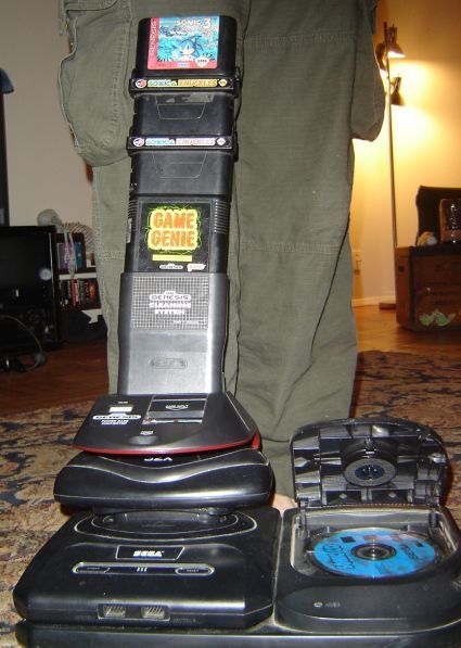 goatygoatyeah:  bridgeportcat:  Would be more “tower” like with a first gen sega cd JUST SAYIN but I still like it goatygoatyeah:  sega-tower-of-power.jpg   I just noticed that there is a skeleton in the background of this picture. 