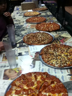 Soo much free pizza at Luigi Ortega’s…