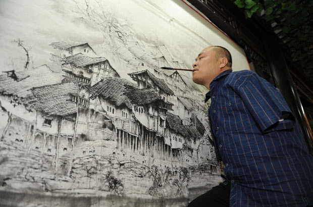 tristanmichael:  A man with no arms has become the vice curator of Chongqing Talents