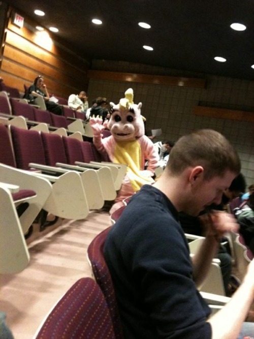 b0mb-pussy:  i dont think anyone in my class has noticed the giant ass dinosaur in the room. or maybe im just hallucinating right now. Oh my god its waving at me. maybe i should stop staring at it and it will go away. 