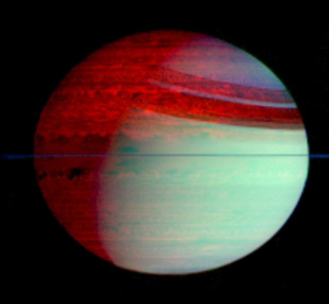 scipsy:  Saturn’s Silhouetted Clouds  This false-color image is part of the “Spectacular