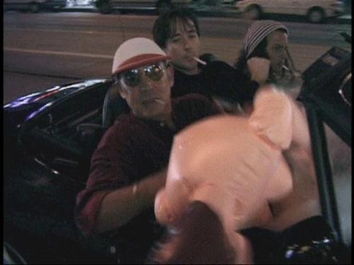  Hunter S. Thompson, John Cusack, Johnny Depp, & a blow up doll.  can we just sit in awe of how awesome this photograph is?