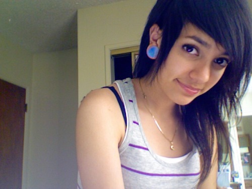 fyeahstretchedears:  7/8 opalescent plugs (: My goal size is an inch. Only one size away! YAY 