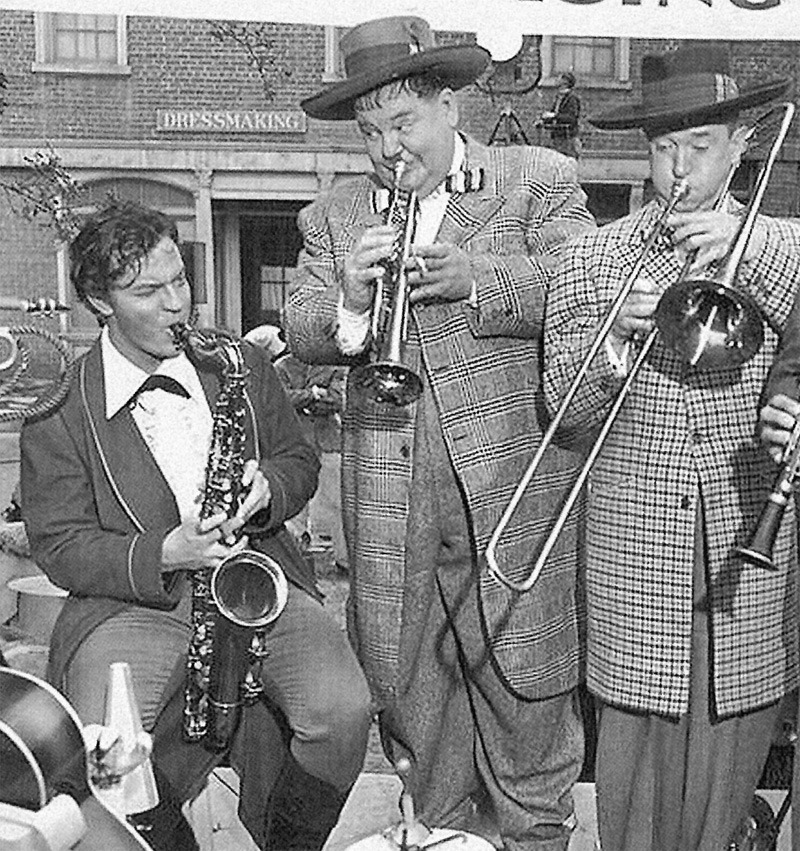 Orson Welles concertizes with Stan Laurel and Oliver Hardy, during the filming of Jane Eyre [1943]