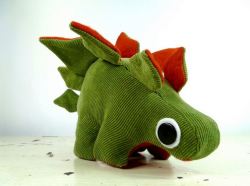 amorningcupofjo:  Corduroy Stegosaurus by Mary Casher! Update: I noticed that many of you may want to get your hands on one of these, so I found her shop for you. Get your own dinosaur here! :) 