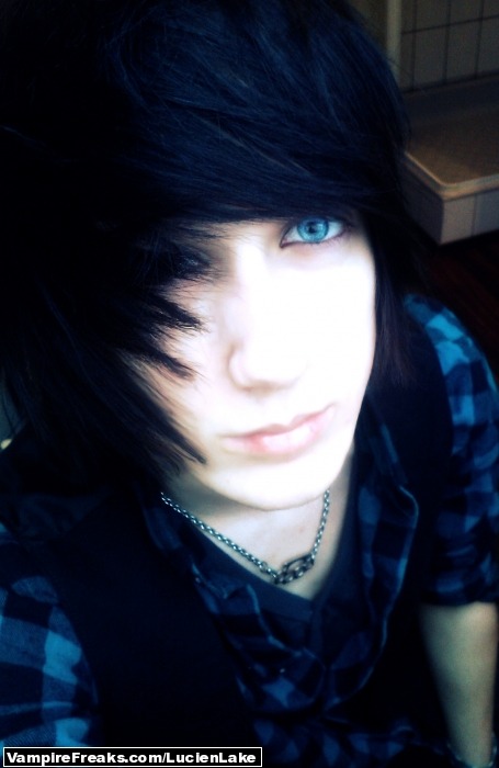 Cute boy with black hair blue eyes