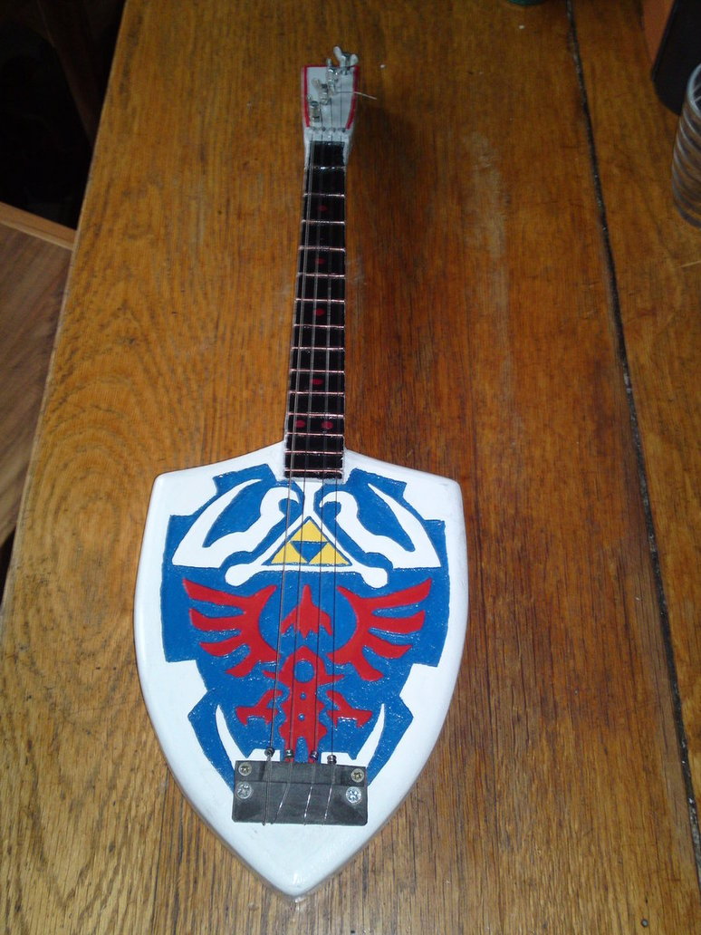 it8bit:  Custom Legend of Zelda Guitar by Ben Groenen Check the deviantart page