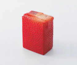 sooothe:  packaging: strawberry juice stored in a strawberry textured packaging 
