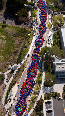 effyocouch:  A picture from my work on 4-21-2011. I helped to organize this Guinness world record event. More than 2,800 people from my company took over a street in South San Francisco, and made a dna helix chain all the way down. Yes, the helix is made