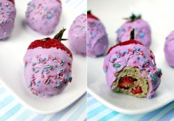 conradshairgel:  moonkistforlife:  punchies:  thedailywhat:  Kickass Comestible of the Day: In honor of National Strawberry Month, Jasmin Fine @ 1 Fine Cookie whips up a batch of her world-famous cupcake-stuffed strawberries. That’s right, fatty: Strawber