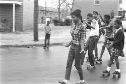 Coolchicksfromhistory:   Group Of Girls Skating In The Street In Front Of A Public