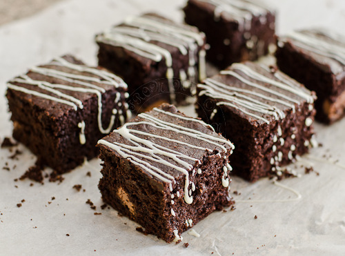 gastrogirl:  chocolate brownies with white chocolate drizzle. 