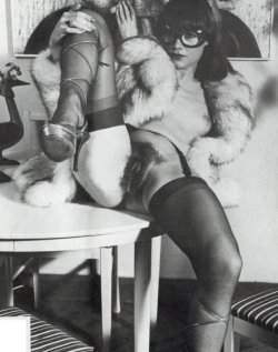 I like in this picture besides the hairy bush, the nylons, the coat, and the glasses.  These items make her to look naughty!! mmmmmmmmmmmmm