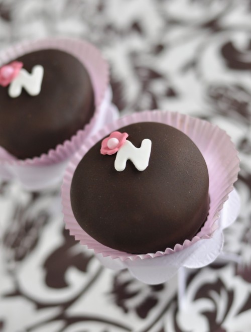 lovelylovelyfood: Chocolate-Fondant Covered Cupcakes  Need. Now. At least a box of six.