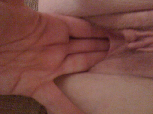 marriedfuckbuddies:  Getting wife warmed up for the beer bottle   Beeeeeeeer… I love stretching a woman’s holes with my fingers.  It feels amazing as they loosen and relax.