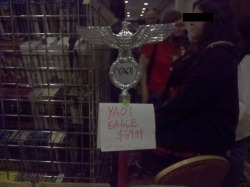 weaboostories:  recently a group of friends and I went to a convention in our area, and this “yaoi eagle” was in the dealers room selling for ๖. they had all this nazi shit but they’d glue paper over the swastikas and write “YAOI” in crude