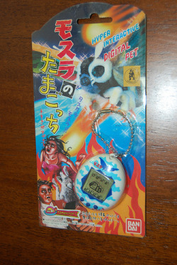 kabutomushii:       Mothra Tamagotchi (by